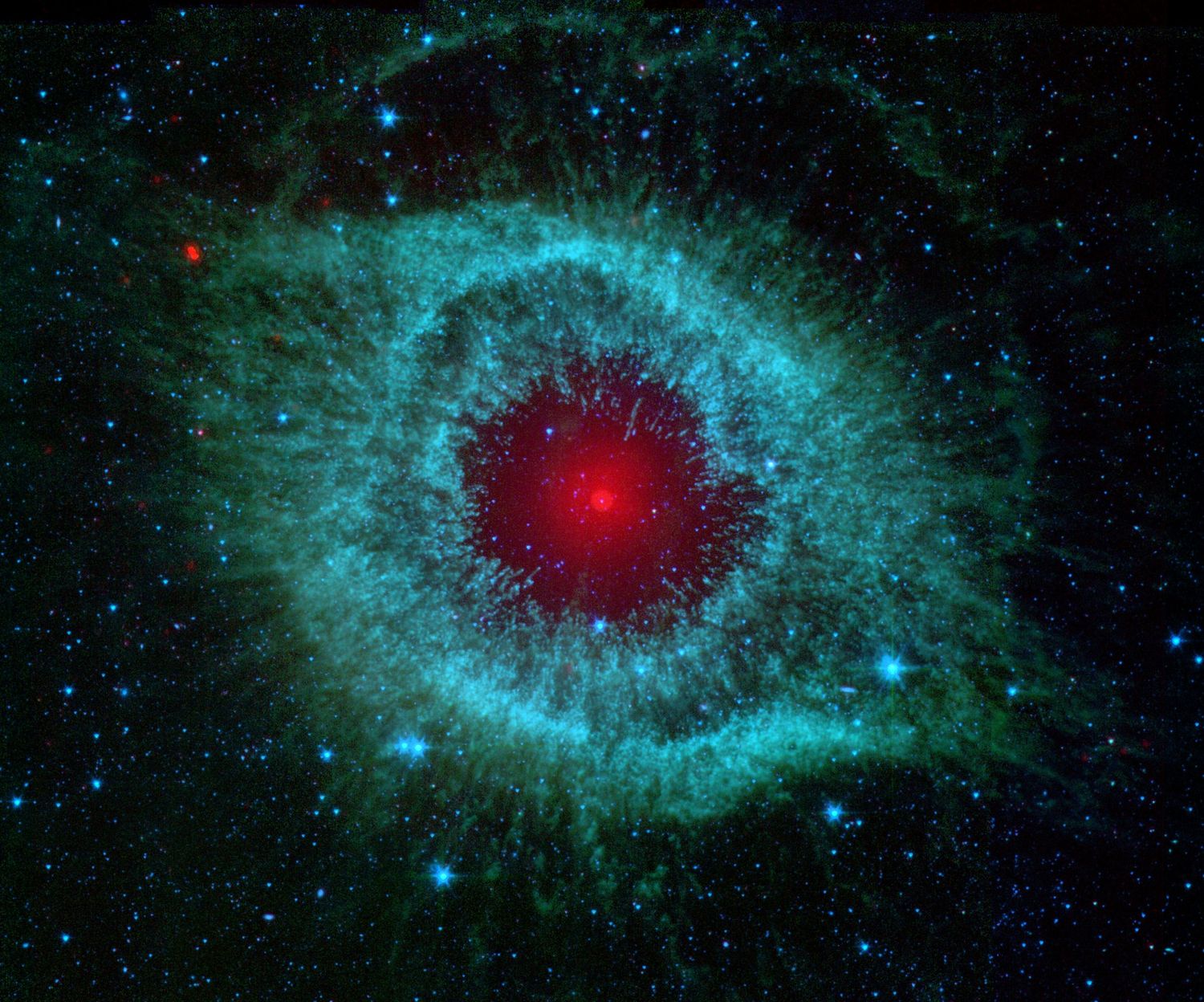 The Helix Nebula imaged by Spitzer